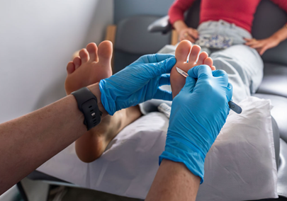 Podiatrist using scalpel